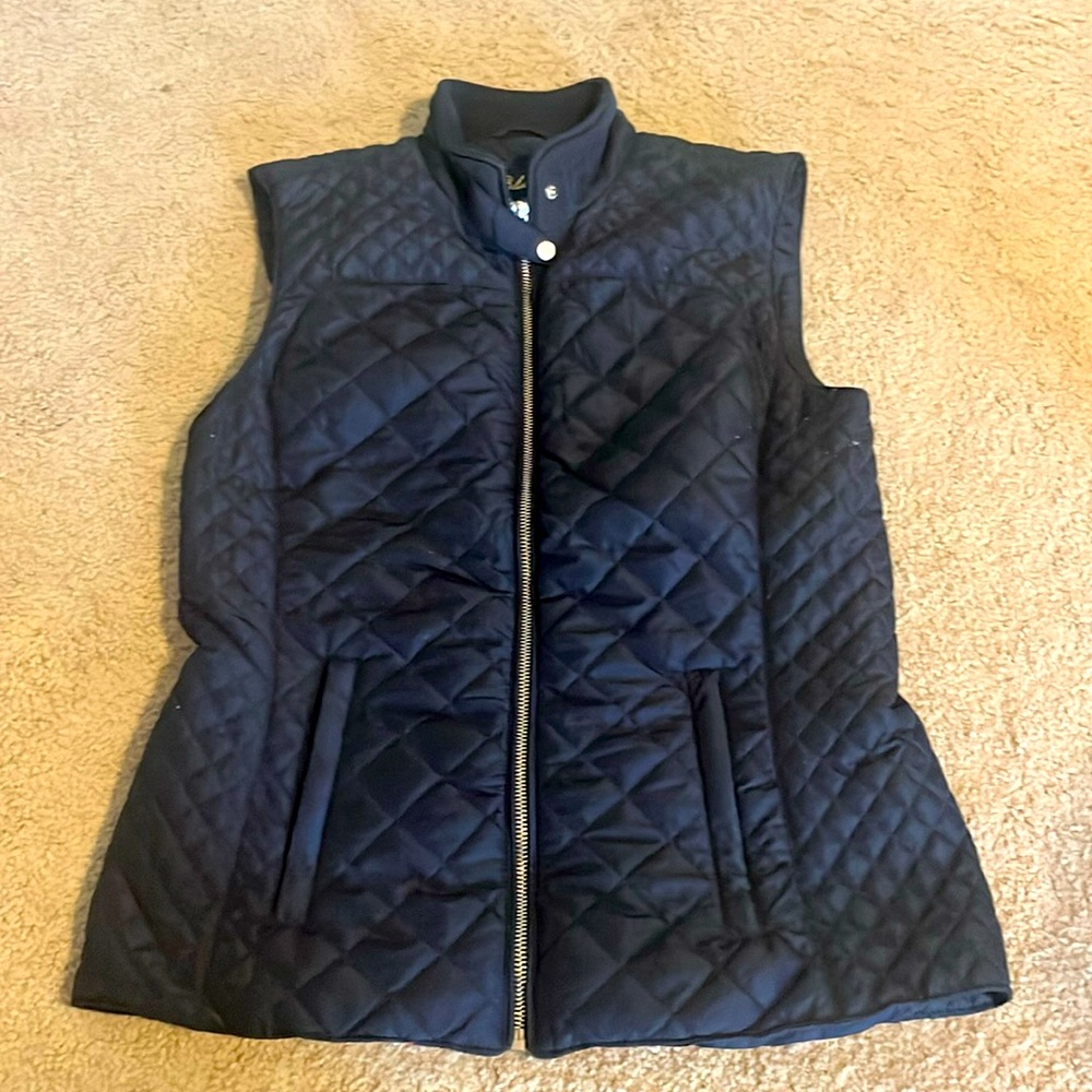 Blue lightweight puffer vest.